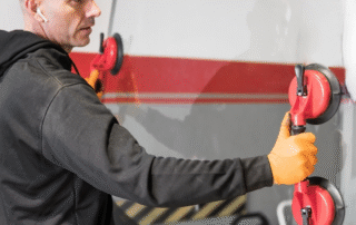 Auto Glass Replacement Near Me technician installing windshield