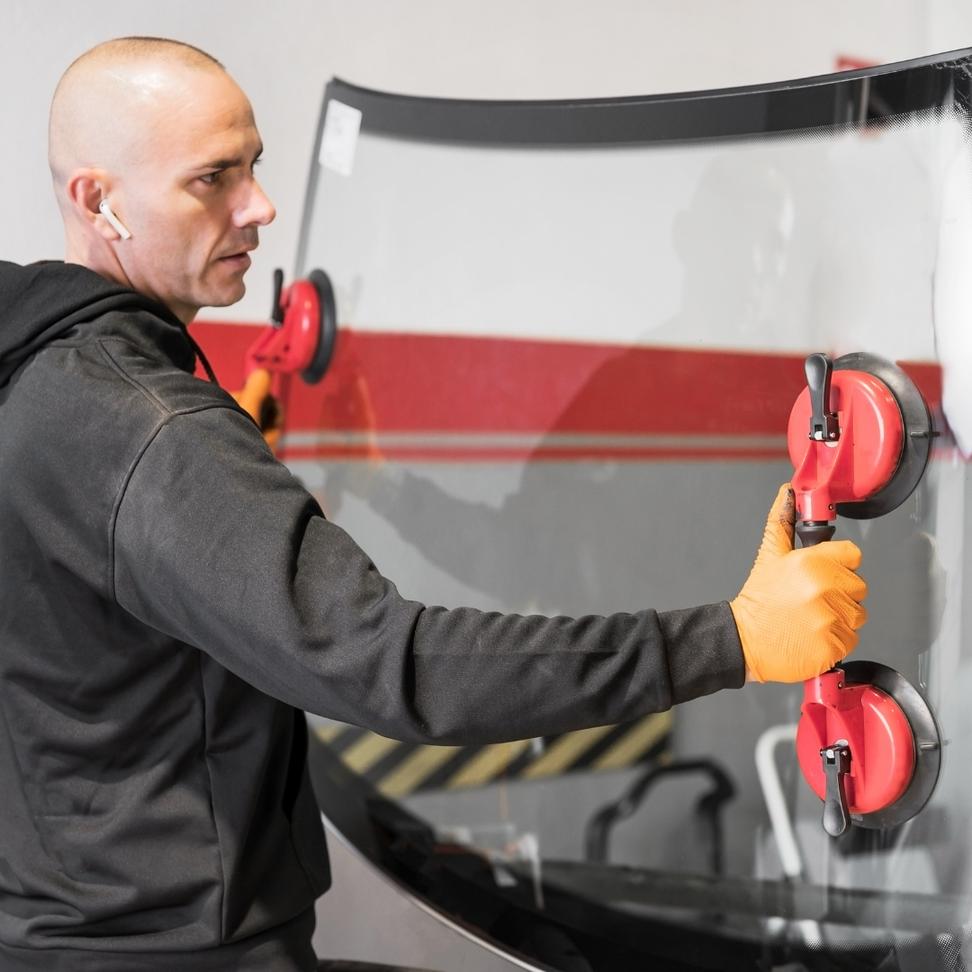 Auto Glass Replacement Near Me technician installing windshield