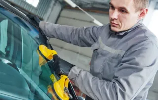 Windshield Cost repair assessment by technician